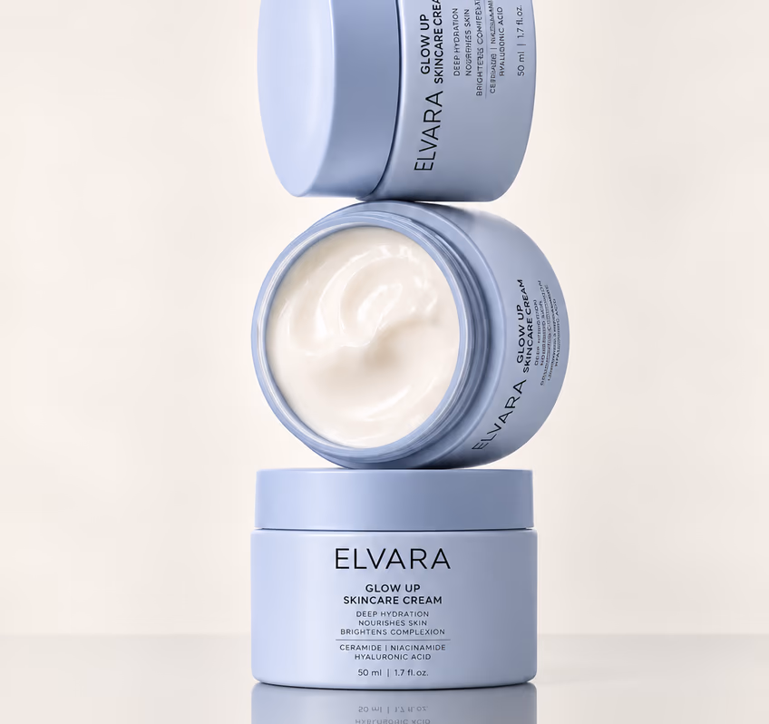 Three Elvara cream jars stacked, the middle one open